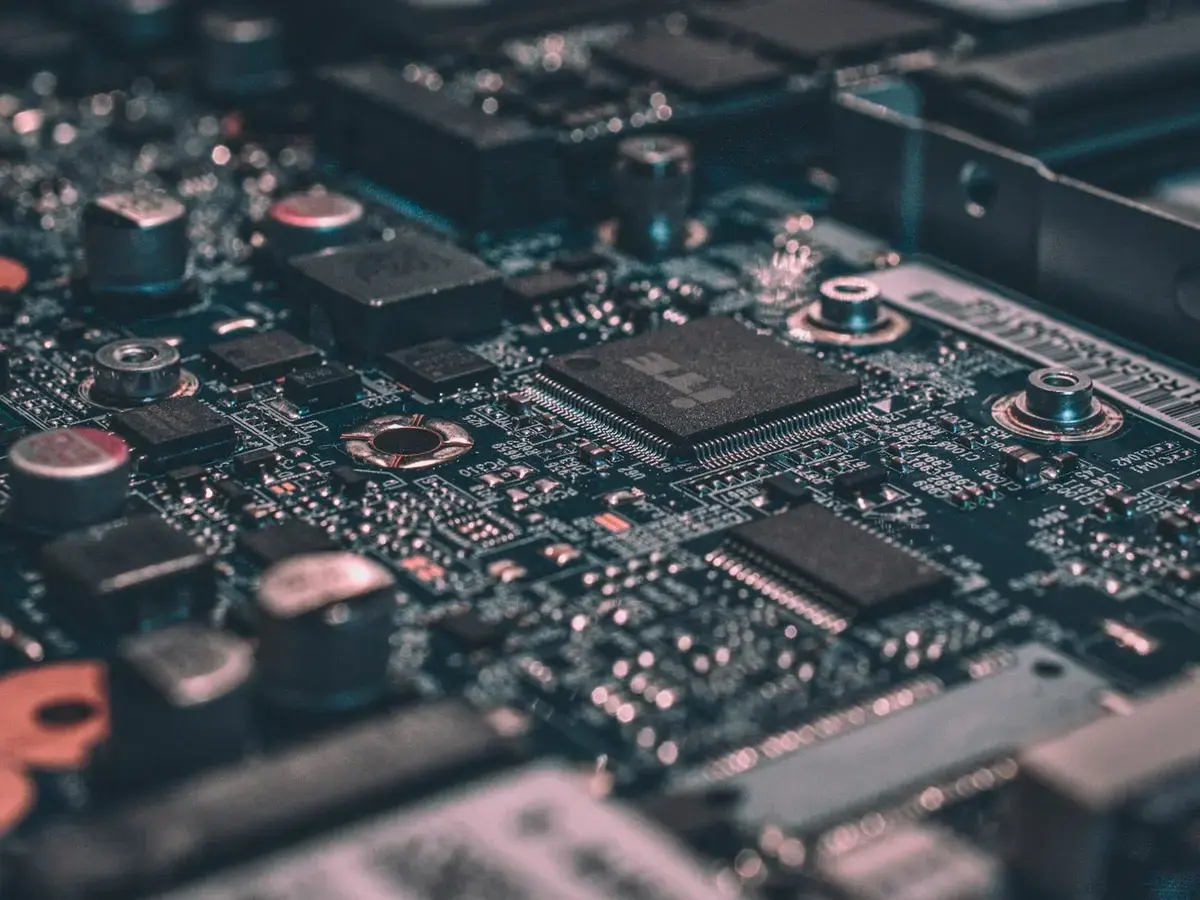 Macro photograph of a circuit board, representing systems and automation